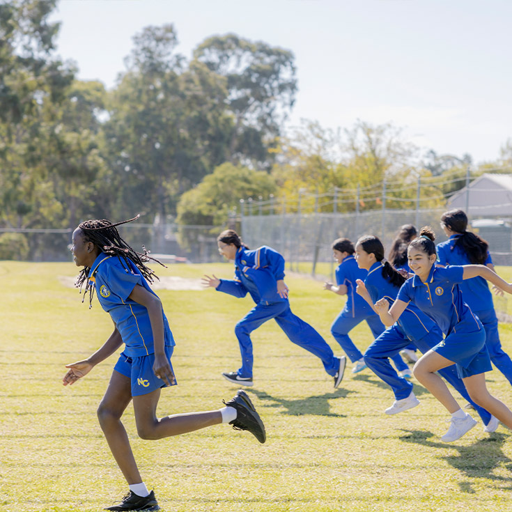 Nagle Catholic College South Blacktown student running on field