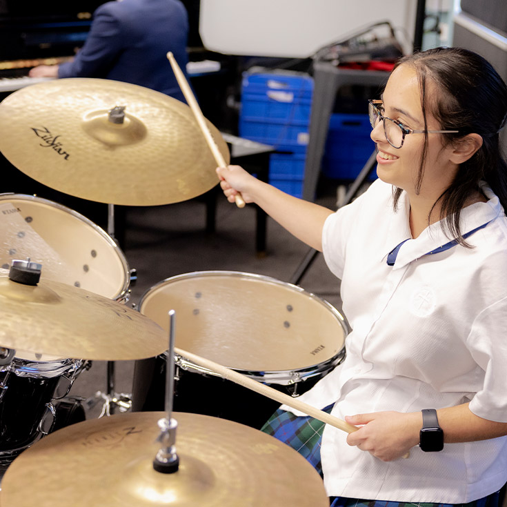 Nagle Catholic College South Blacktown student learning drums